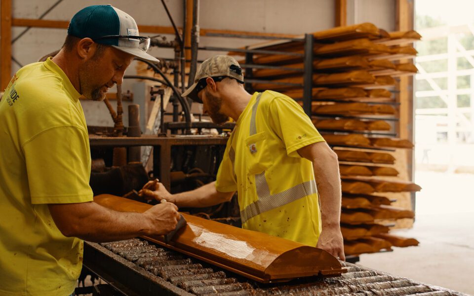 Applying stain in the WoodHaven mill