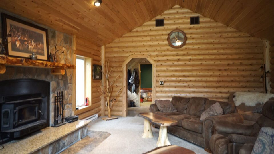 Cedar log siding used in a home interior.