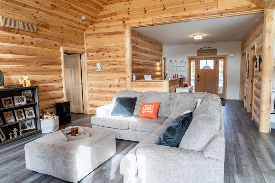 Custom Living Room with Log Siding and Tongue and Groove Paneling