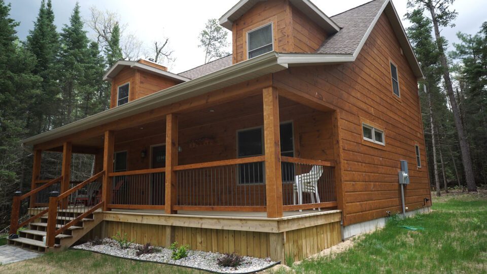 Flat-faced log paneling for a more modern look.