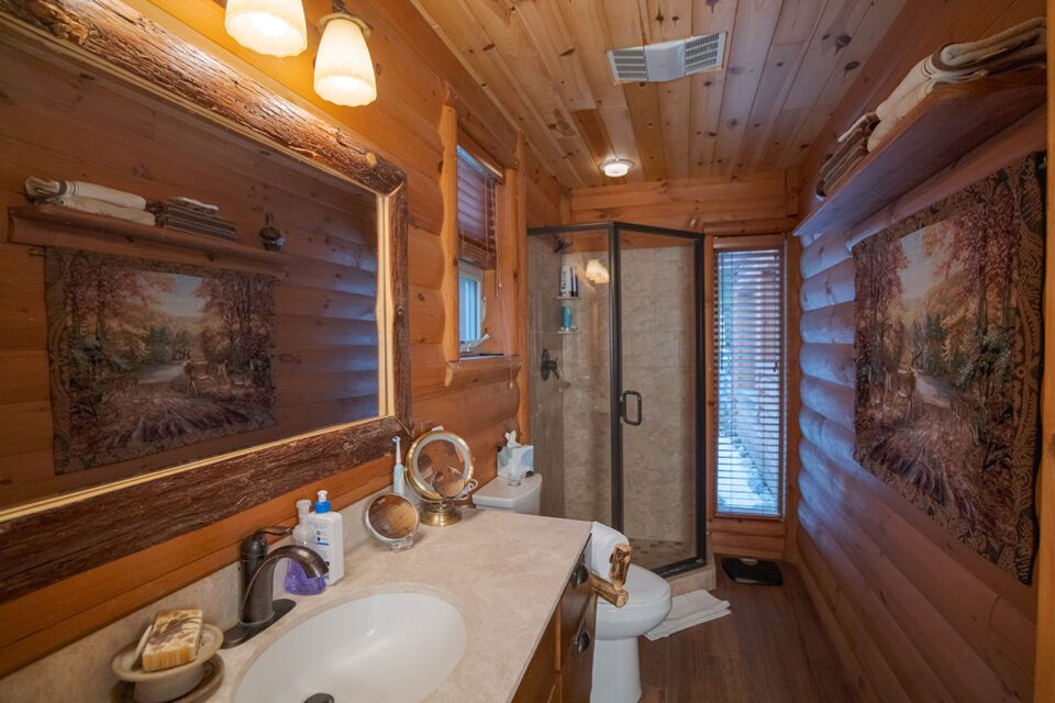 Lake House Bathroom with a Log Cabin Feel