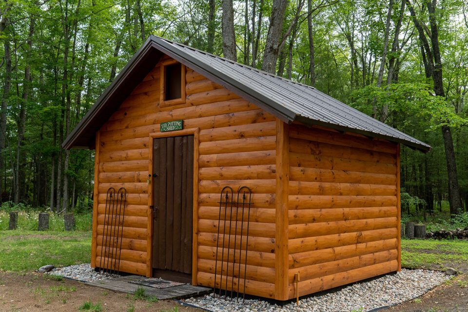 Potting shed with WoodHaven log siding