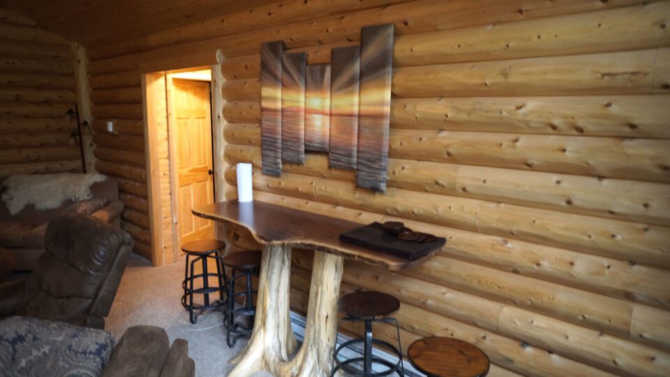 WoodHaven log siding installed on an interior wall. Notice how this looks more like a traditional log cabin.