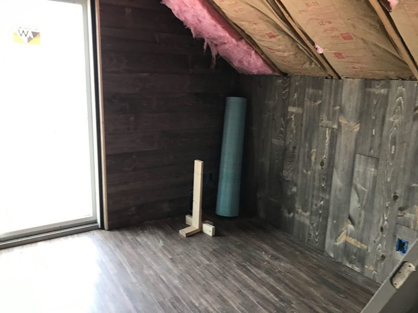 Barn wood paneling with sticker marks