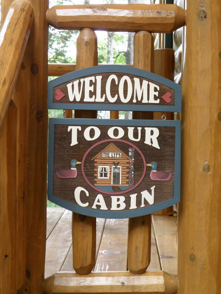 WoodHaven front entrance porch with cedar posts and spindles