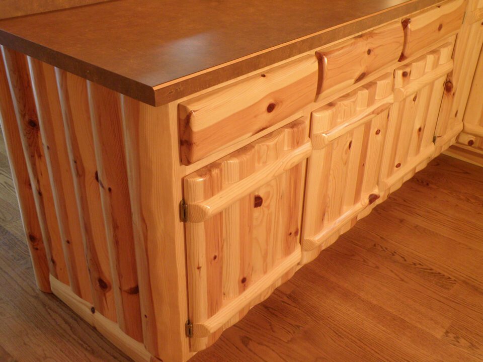 Knotty pine log kitchen cabinets