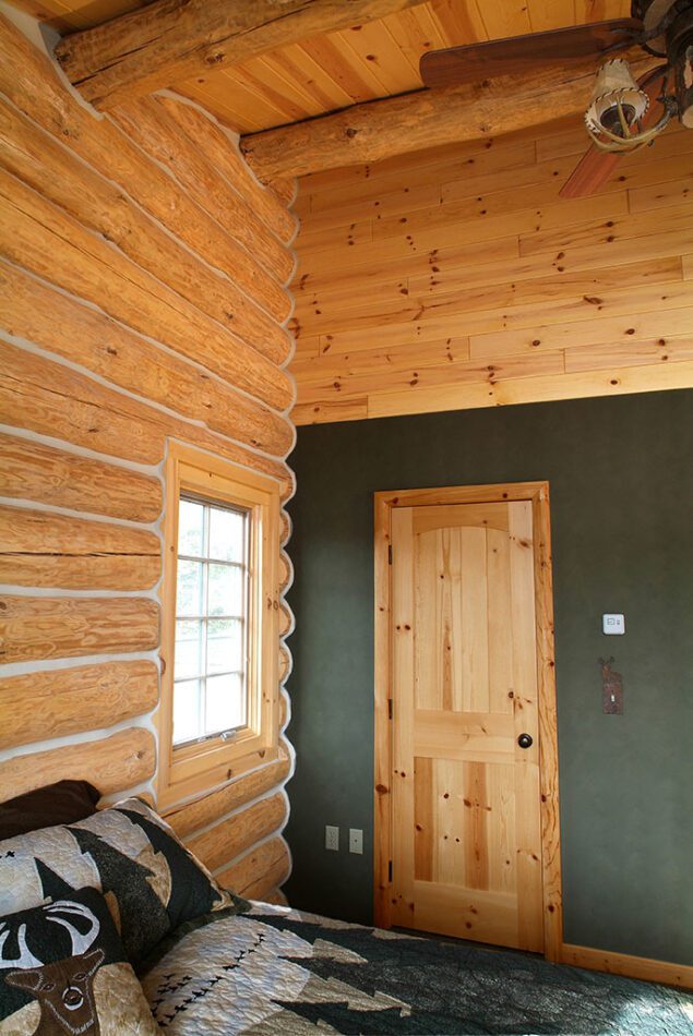 Knotty pine paneling and custom door