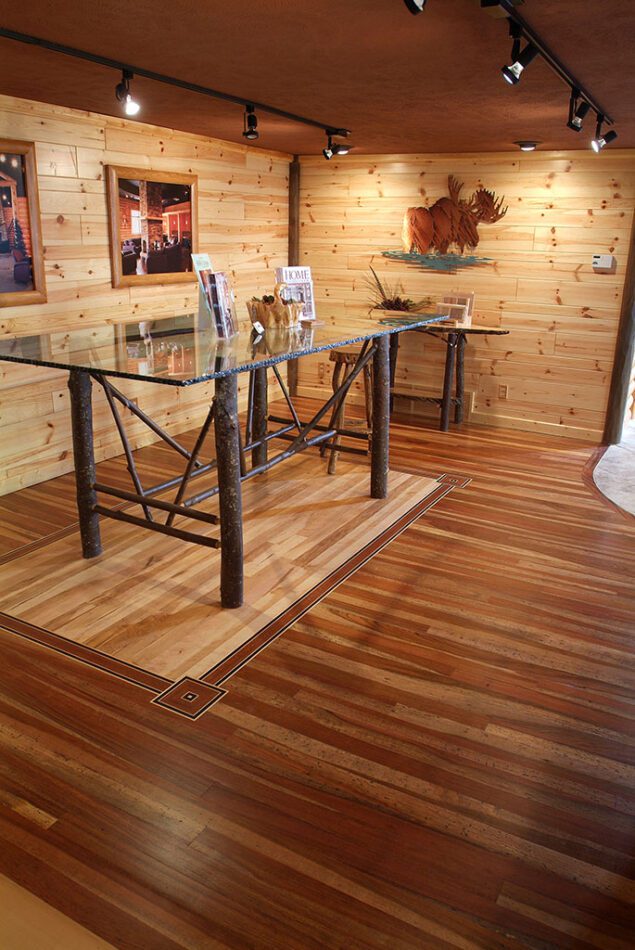 Commercial building knotty pine walls and natural pine flooring