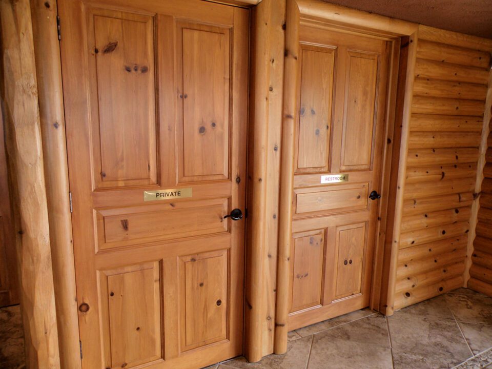 Commercial building with five-panel doors made with our knotty pine paneling